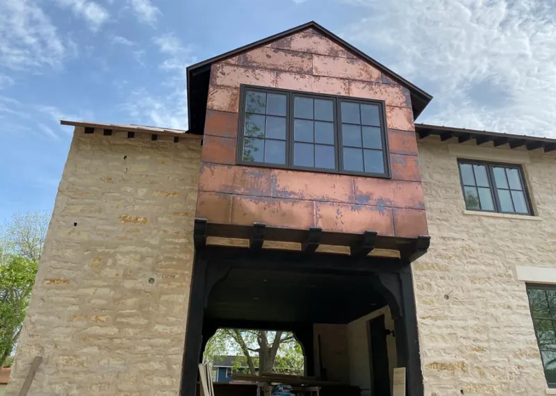 Copper metal panel facade on a stone building for Metal Roof Coating in Menlo Park